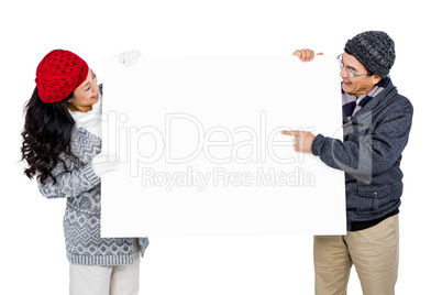 Couple with blank billboard