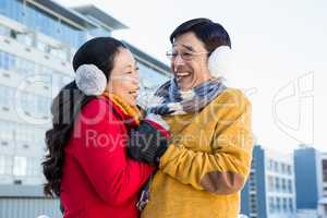 Older asian couple on balcony