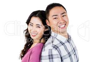 Asian couple smiling at camera