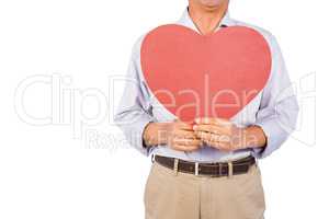 Older asian man showing heart