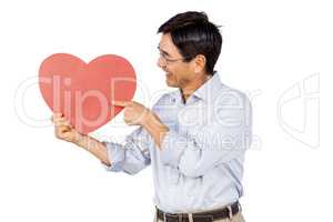 Older asian man showing a heart