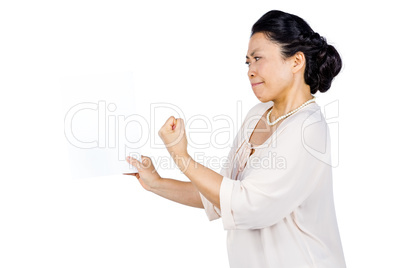 Angry woman shaking her fist