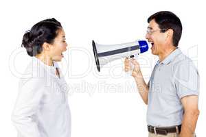 Man shouting at his partner through megaphone