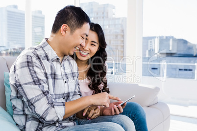 Couple using smart phone