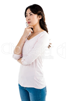Thoughtful woman with hand on cheek