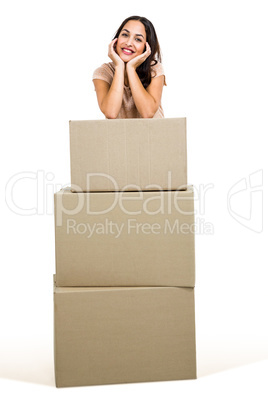 Portrait of smiling woman with boxes