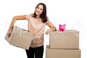 Portrait of smiling woman with boxes