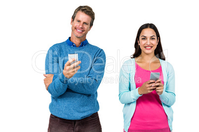 Portrait of man and woman using phone