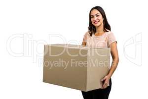 Portrait of smiling woman holding box