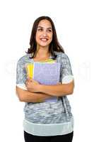 Close-up of smiling woman holding books