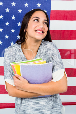 Smiling woman against American flag