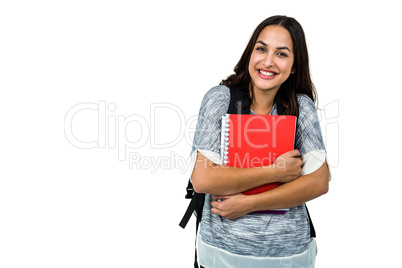 Happy woman holding books