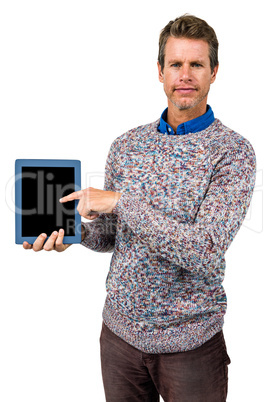 Close-up portrait of man holding digital tablet