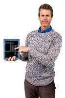Close-up portrait of man holding digital tablet