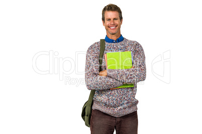 Portrait of smiling man holding books