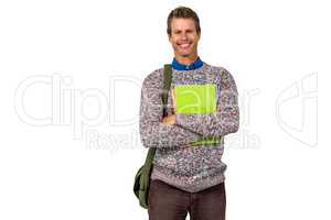 Portrait of smiling man holding books