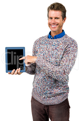 Portrait of happy man holding digital tablet