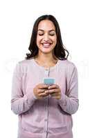 Smiling woman using mobile phone