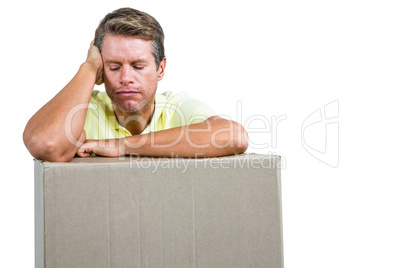 Close-up of sad man with box