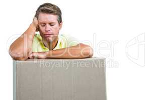 Close-up of sad man with box
