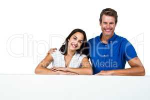 Happy couple against white background