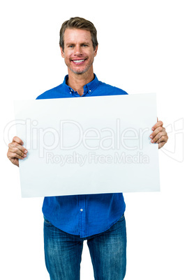 Happy man holding board