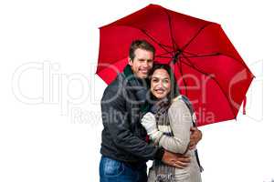 Portrait of happy couple with umbrella