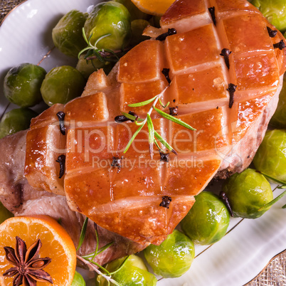 Christmas dinner with brussels sprouts in orange sauce