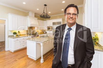 Man Wearing Necktie in Beautiful Custom Residential Kitchen
