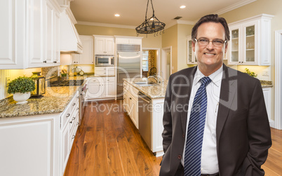 Man Wearing Necktie in Beautiful Custom Residential Kitchen