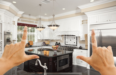 Hands Framing A Beautiful Custom Kitchen