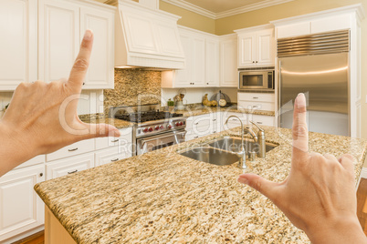 Hands Framing A Beautiful Custom Kitchen