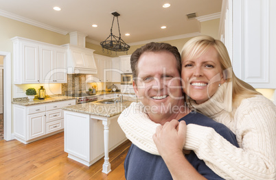 Happy Couple Inside Beautiful Custom Kitchen