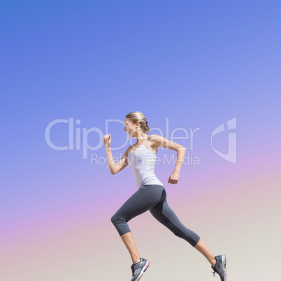 Composite image of pretty fit blonde jogging