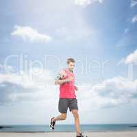 Composite image of fit man running