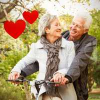 Composite image of senior couple in the park