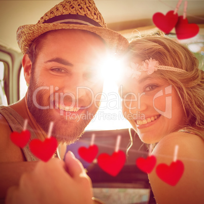 Composite image of hipster couple on road trip