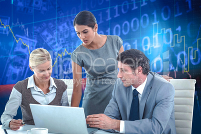 Composite image of business people using laptop