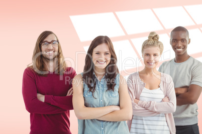 Composite image of portrait of smiling business team with arms c