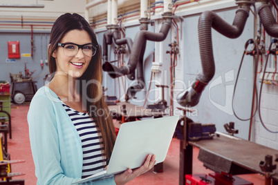 Composite image of pretty girl with laptop