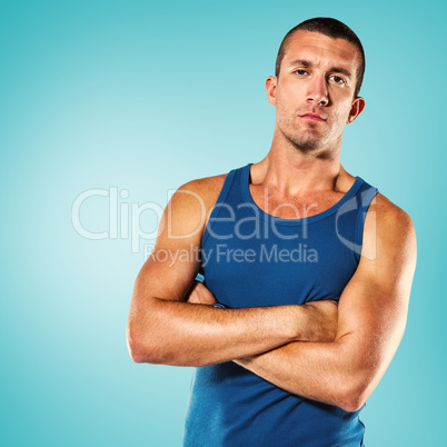 Composite image of serious athlete with arms crossed Composite image of serious athlete with arms crossed