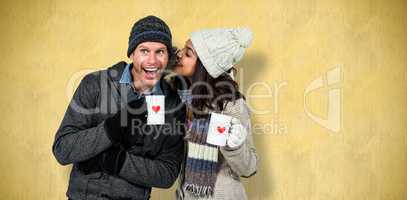 Composite image of winter couple enjoying hot drinks