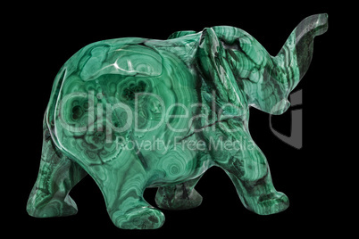 Elephant figurine from malachite, isolated on black background,