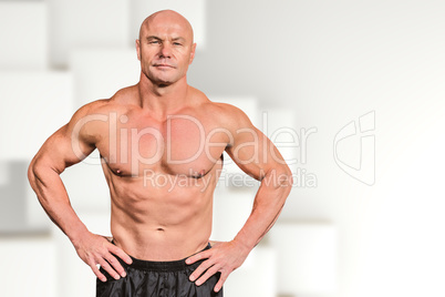 Composite image of portrait of bald man with hand on hip