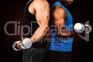 Composite image of strong friends posing with dumbbells