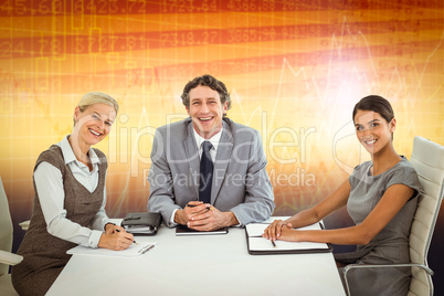 Composite image of portrait of smiling business people sitting a