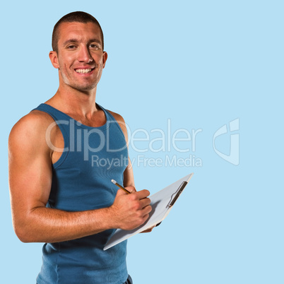 Composite image of portrait of confident sports coach writing on