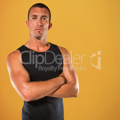 Composite image of confident athlete with arms crossed
