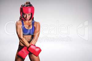 Composite image of portrait of fit female boxer