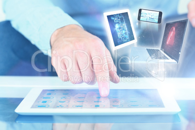 Composite image of close up of finger from man touching tablet